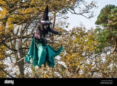 Twelve foot high witch taking flight